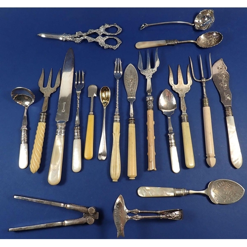 171 - A group of silver-plated cutlery items,  includes grape scissors, cake knife, jam spoons, bread fork... 