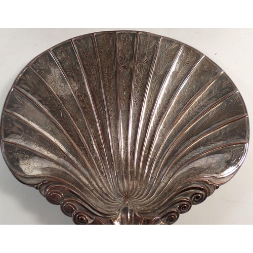 182 - A 19th century silver-plated tray with engraved decoration and silver-plated shell form tray 27 x 28... 