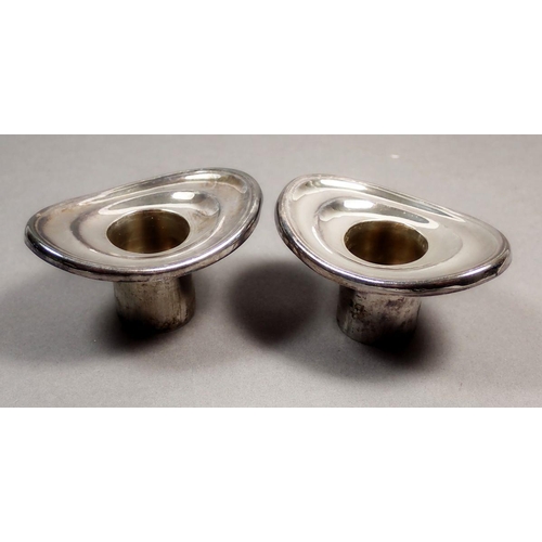 193 - A pair of silver oval candle sconces