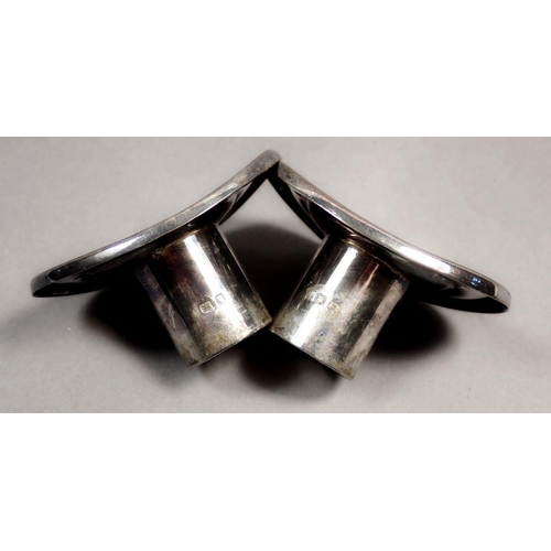 193 - A pair of silver oval candle sconces