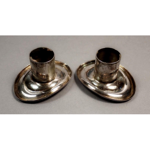 193 - A pair of silver oval candle sconces