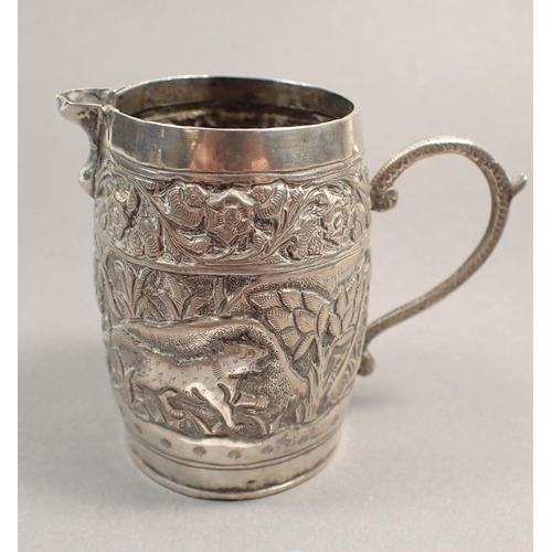 197 - An Indian white metal cream jug, a filigree junk and a cylindrical box