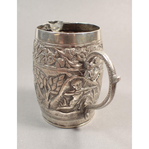 197 - An Indian white metal cream jug, a filigree junk and a cylindrical box