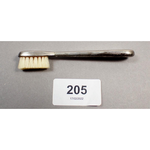 205 - An Edwardian silver travelling toothbrush, London 1910, approx 9cm long