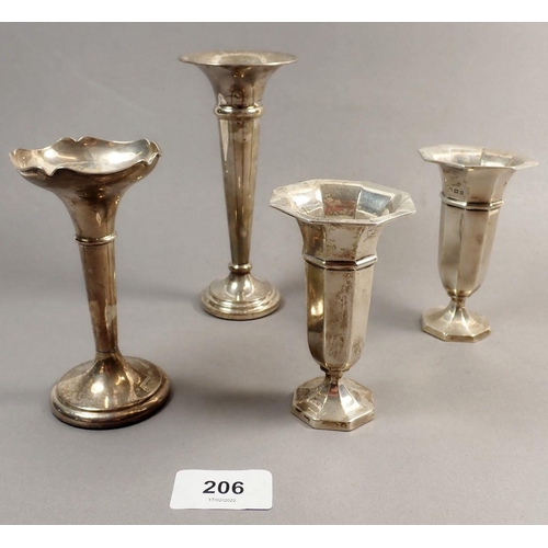 206 - A pair of silver octagonal bud vases, 10cm, Birmingham 1912 and two other silver bud vases