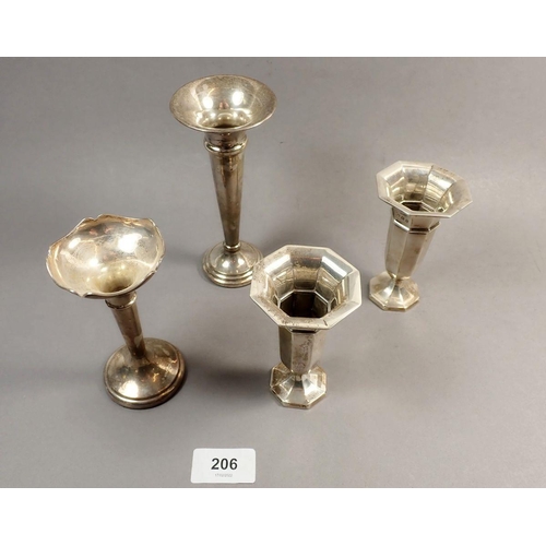 206 - A pair of silver octagonal bud vases, 10cm, Birmingham 1912 and two other silver bud vases