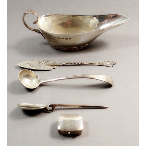 210 - A group of small silver items including small sauce boat, Birmingham 1902, butter knife, Birmingham ... 