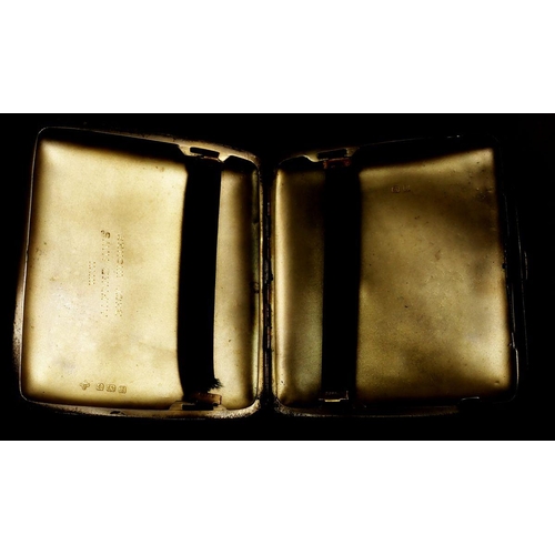 213 - A silver military cigarette case, engraved regimental crest, 173.5g, Birmingham 1919