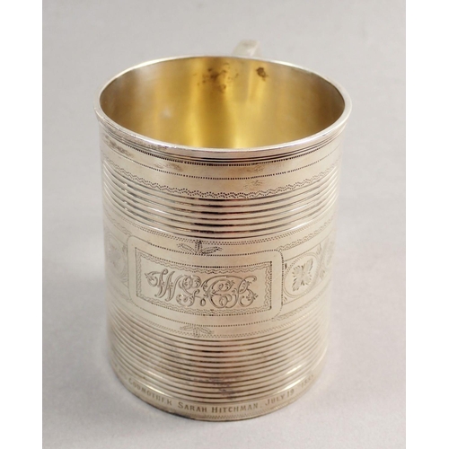 223 - A Victorian silver tankard, engraved vines and presentation,  in fitted leather case, London 1883, 1... 