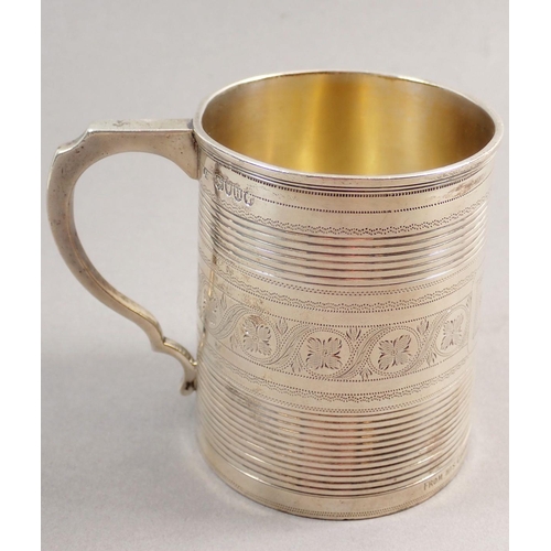 223 - A Victorian silver tankard, engraved vines and presentation,  in fitted leather case, London 1883, 1... 