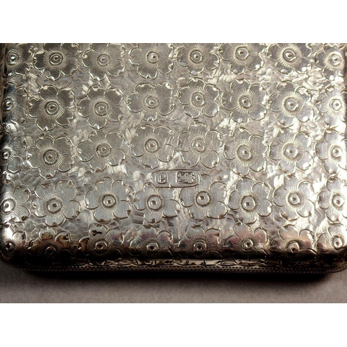 226 - A Victorian silver note case with engraved floral decoration, fitted interior with a pencil and ivor... 