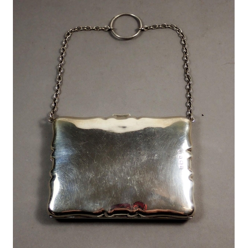 227 - A George V silver purse with wrist chain and finger ring, fitted leather interior, 10.5cm wide, make... 