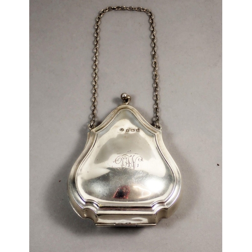 228 - A George V silver purse with leather interior approx 8cm length, Birmingham 1917, maker T Heatley, 5... 