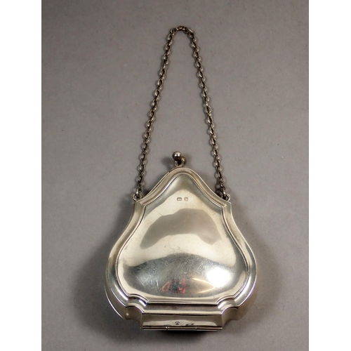 228 - A George V silver purse with leather interior approx 8cm length, Birmingham 1917, maker T Heatley, 5... 