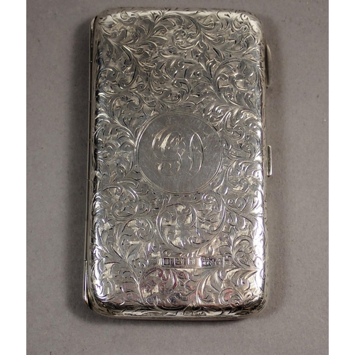 231 - A George V silver notecase with scroll decoration and fitted interior with pencil and ivory insert, ... 