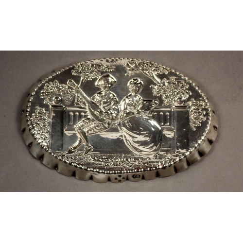 233 - A Victorian silver pin dish/trinket dish of oval form, repousse decoration of a seated lady and gent... 