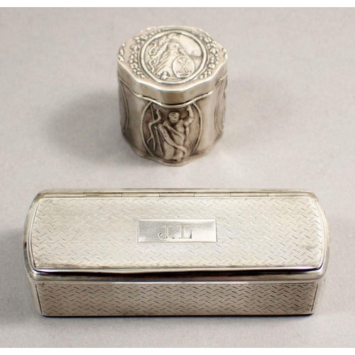 236A - A 19th century French snuff box with embossed decoration and a Dutch silver box