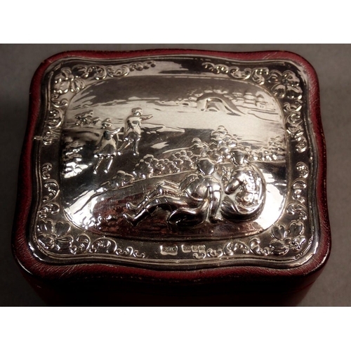 239 - A silver-topped leather trinket box, embossed landscape and figures 10 x 8.5cm, London 1985