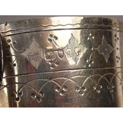 243 - A Victorian silver mug with engraved decoration, London 1871 by Thomas Smily, 147g 8cm tall