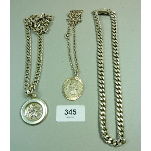 345 - A heavy silver curb chain and two silver St Christophers and chains, 237g total