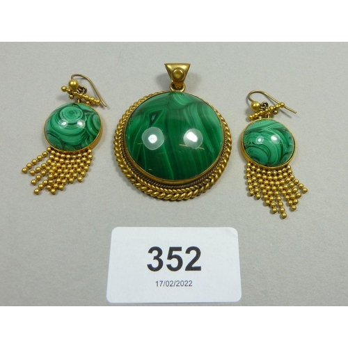 352 - A pair of gilt metal and malachite earrings in the Etruscan revival design with beadwork tassels and... 