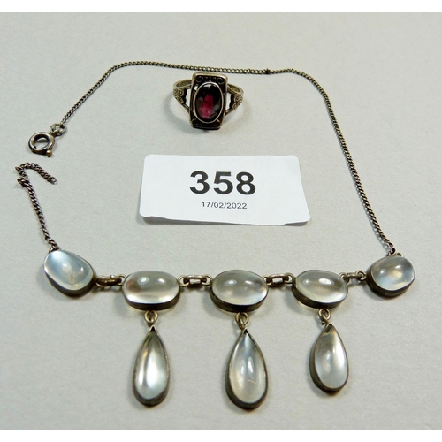 358 - A silver moonstone necklace (a/f) and a silver ring set with a purple stone