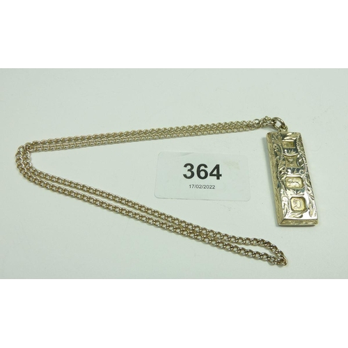 364 - A silver engraved ingot on silver plated chain