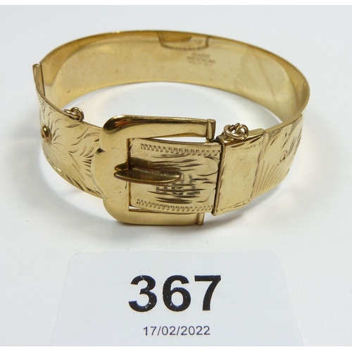 367 - A rolled gold engraved buckle form hinged bangle