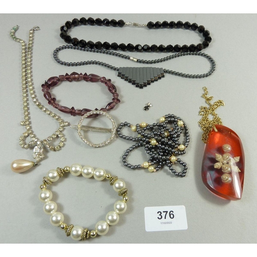 376 - A small quantity of costume jewellery to include a French jet necklace etc