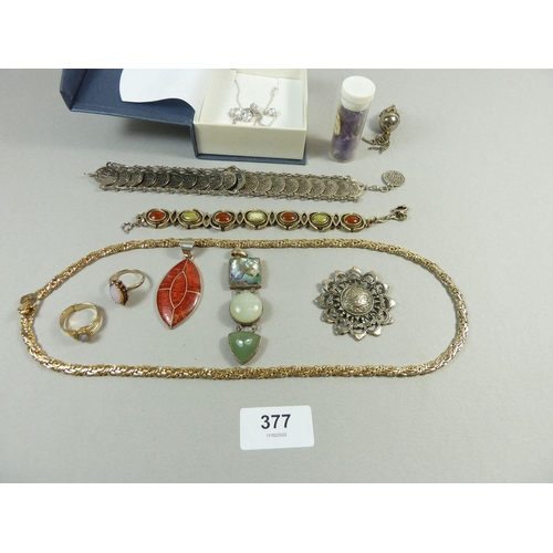 377 - An assortment of costume and silver jewellery to include two silver pendants, coin bracelet, 'Miracl... 