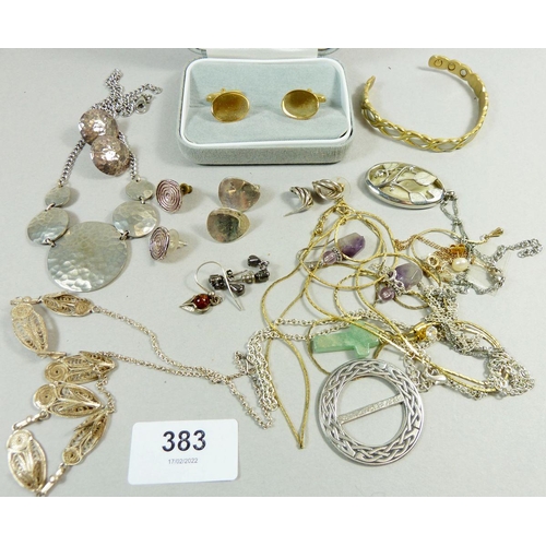 383 - An assortment of jewellery to include a white metal filigree necklace, earrings, a yellow metal neck... 