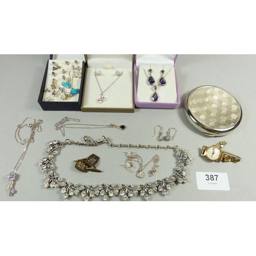 387 - A collection of silver and costume jewellery including earrings, necklaces, cufflinks etc together w... 