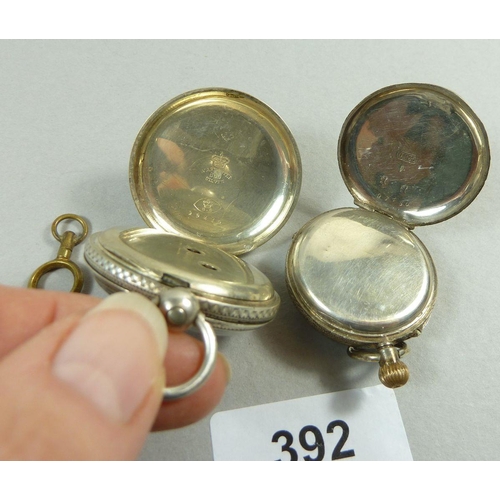 392 - A continental 800 standard silver fob watch with key and another silver fob watch stamped 935