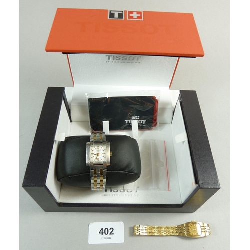 402 - A Tissot stainless steel ladies wrist watch, boxed and a gold plated Rotary watch