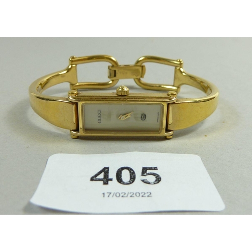 405 - A Gucci gold plated ladies bracelet watch