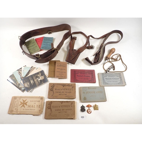 480 - A mixed box of WWI collectables including belt, whistle, Ypres postcards, prayer book etc