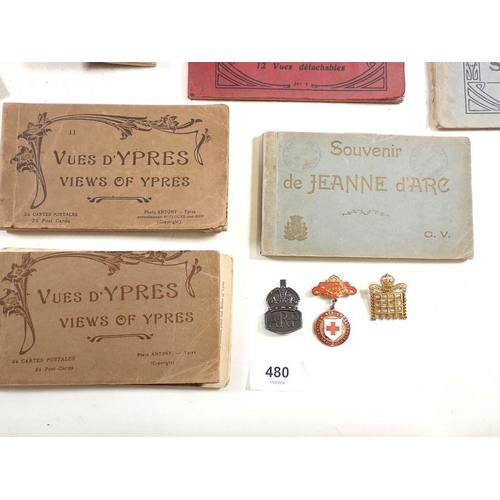 480 - A mixed box of WWI collectables including belt, whistle, Ypres postcards, prayer book etc