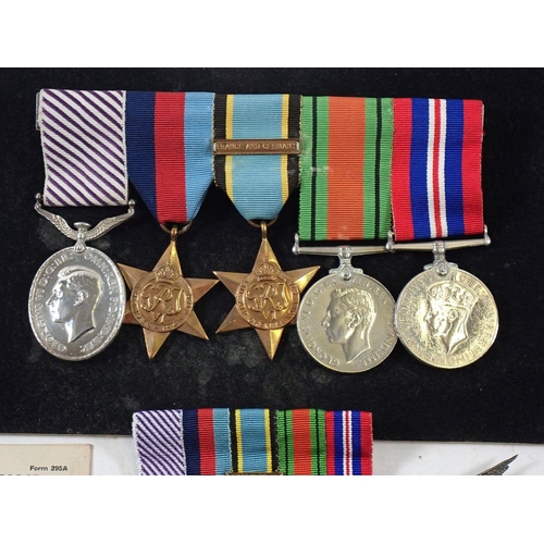 502 - A Distinguished Flying Medal 1918 to Flight Sergeant L A Harman RAF 1291119 with WWII Defence Medal ... 