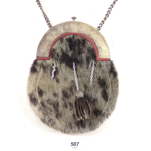 507 - A Scottish seal fur sporran with silver-plated fittings and strap