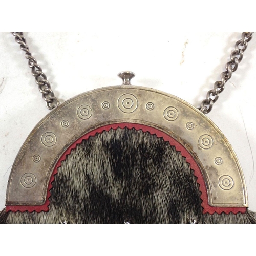 507 - A Scottish seal fur sporran with silver-plated fittings and strap