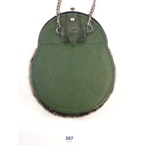 507 - A Scottish seal fur sporran with silver-plated fittings and strap