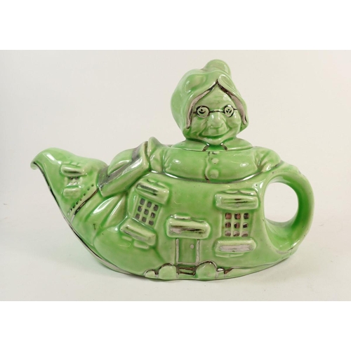 75 - A retro novelty teapot in the form of The Old Woman who lived in a shoe and a Wedgwood Strawberries ... 