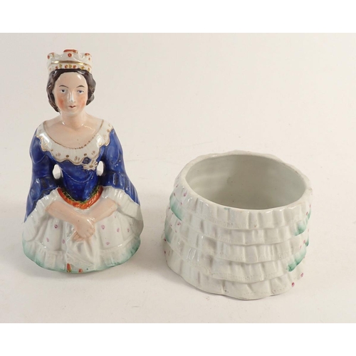 89 - A Staffordshire china Queen Victoria figure form trinket box