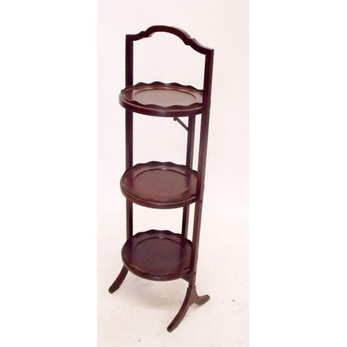 927 - A mahogany folding cake stand