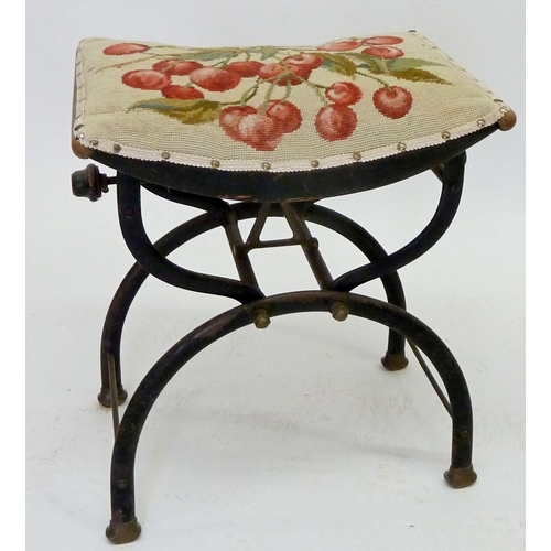 930 - A Hare & Co wrought iron and brass adjustable piano stool