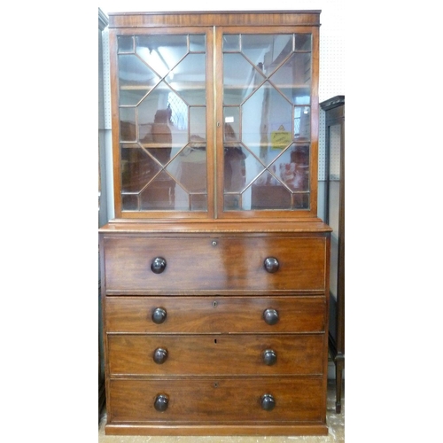 934 - A 19th century mahogany secretaire bookcase with two glazed doors over associated base with secretai... 