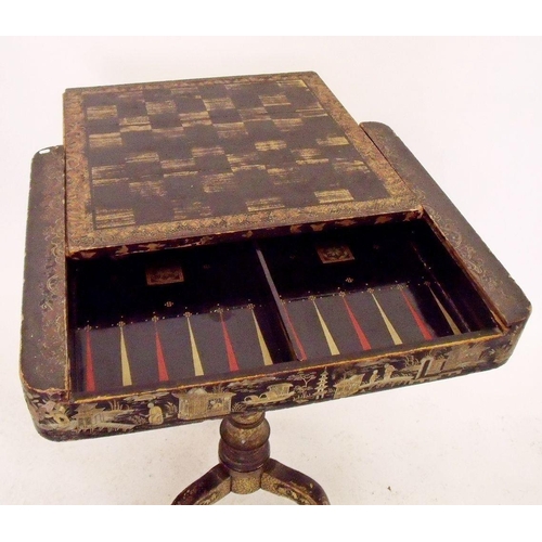 936 - A 19th century Chinese export black and gilt lacquer games table with removable chess board top and ... 