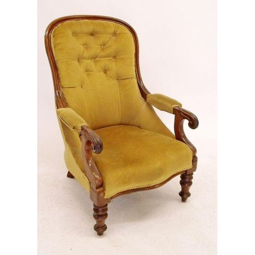 937 - A Victorian mahogany framed armchair with scrollover arms