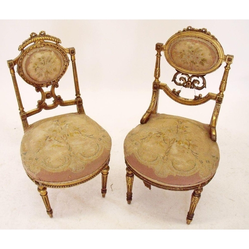 942 - Two French 19th century gilt framed salon chairs with petit point upholstery, 82cm high