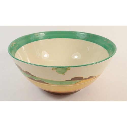 97 - A Clarice Cliff Bizarre fruit bowl, painted landscape and house in the Secrets pattern, 20cm diamete... 